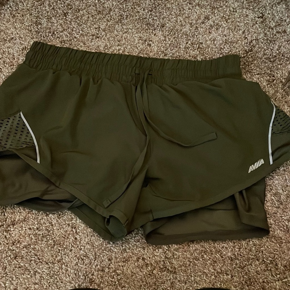 Green athletic shorts Size: M